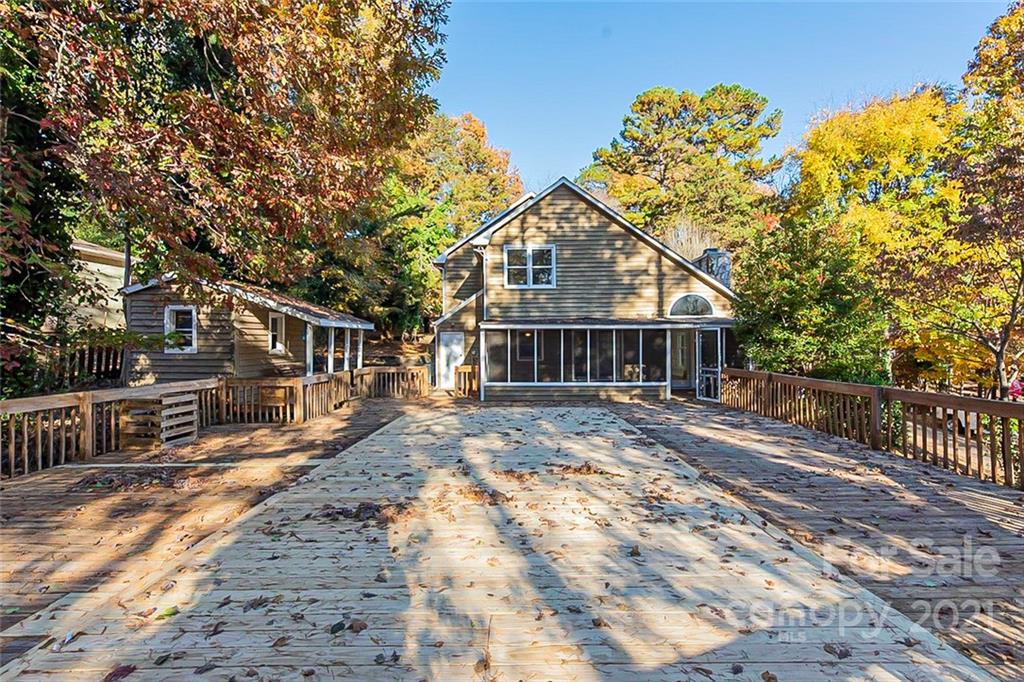 4059 Point Clear Drive Tega Cay, SC 29708 - Photo 15 of 16 a front view of a house with a yard
