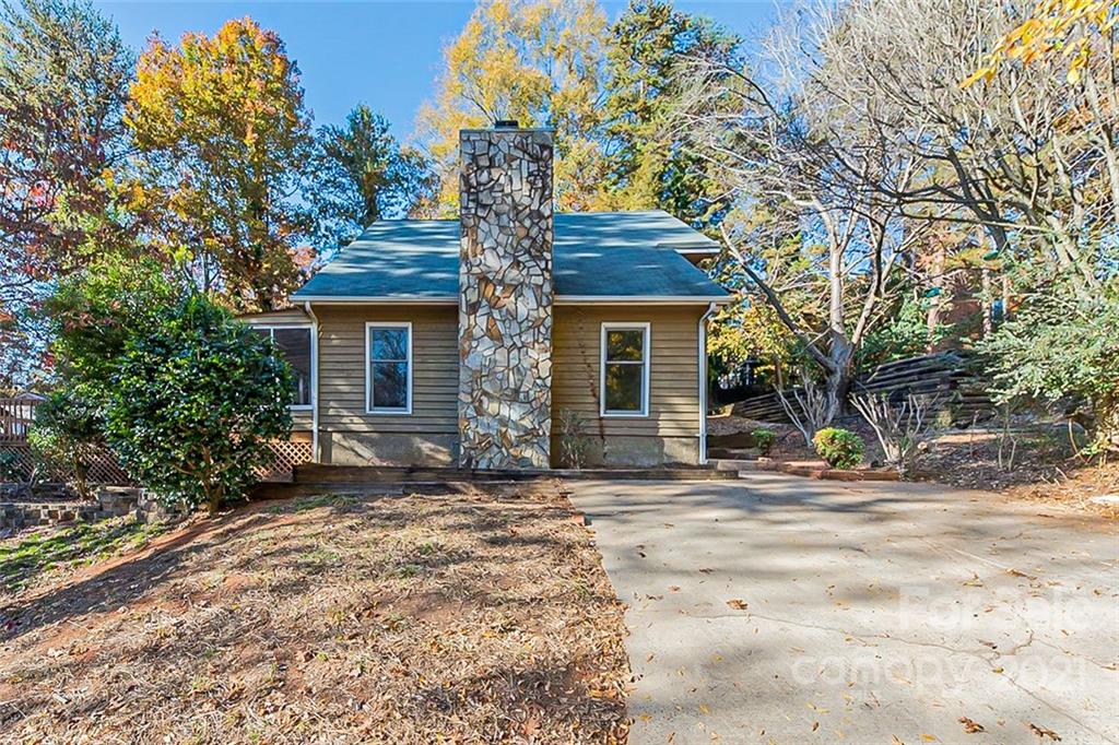 4059 Point Clear Drive Tega Cay, SC 29708 - Photo 16 of 16 a view of a house with a tree in the background