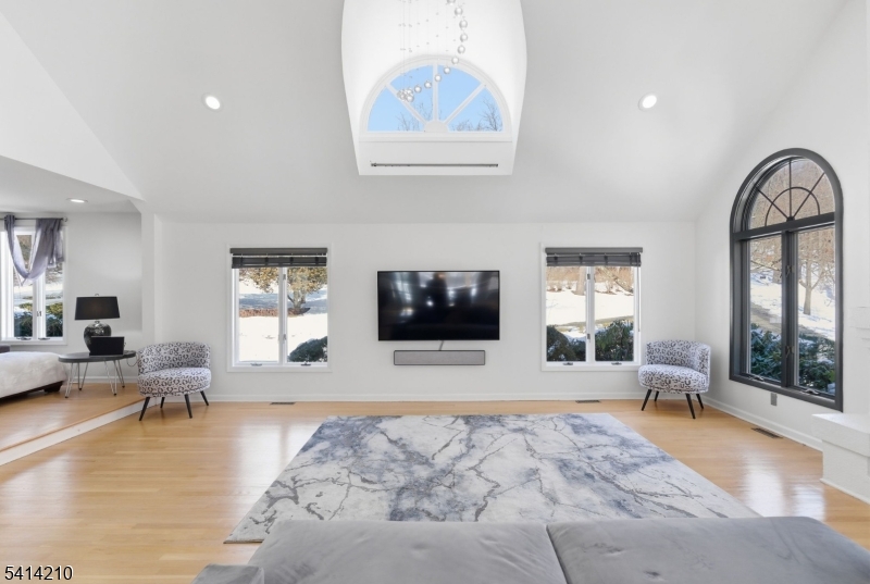 7 Post House Road Morristown, NJ 07960 - Photo 11 of 50 a living room with furniture and a flat screen tv