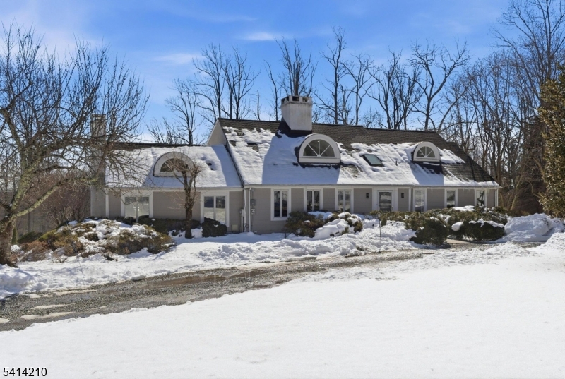 7 Post House Road Morristown, NJ 07960 - Photo 2 of 50 a view of a house with snow on the road