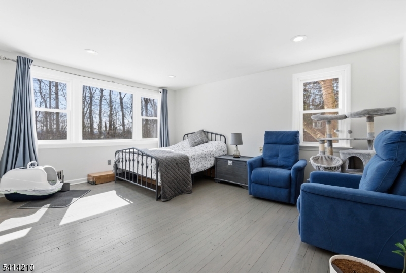 7 Post House Road Morristown, NJ 07960 - Photo 23 of 50 a bedroom with furniture and a couch