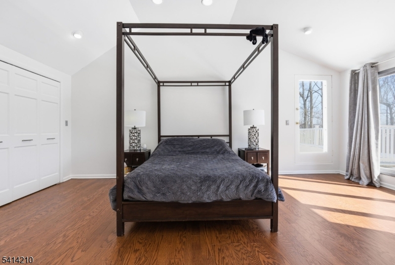 7 Post House Road Morristown, NJ 07960 - Photo 28 of 50 a bedroom with a bed and a mirror