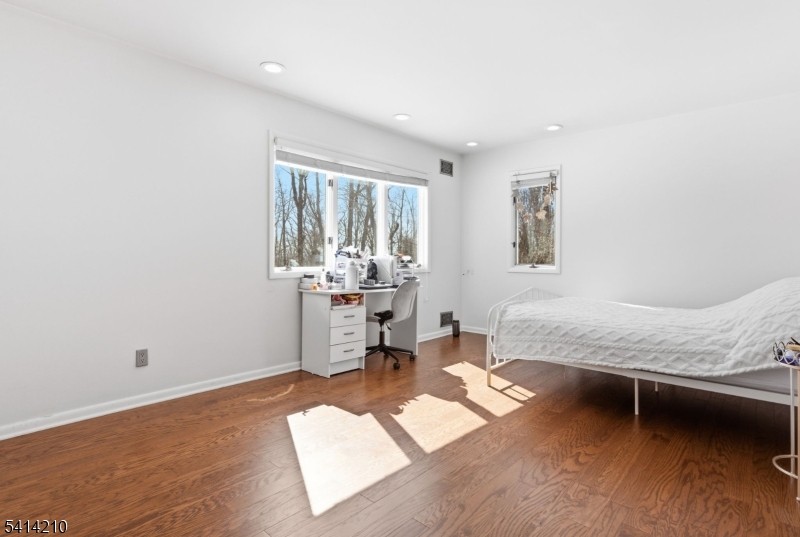 7 Post House Road Morristown, NJ 07960 - Photo 33 of 50 a living room with furniture and a wooden floor