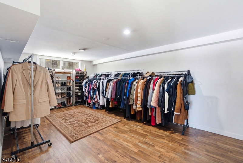 7 Post House Road Morristown, NJ 07960 - Photo 39 of 50 a view of walk in closet with clothes