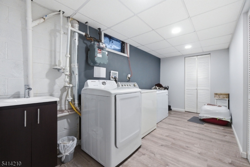 7 Post House Road Morristown, NJ 07960 - Photo 41 of 50 a view of a hallway with washer and dryer