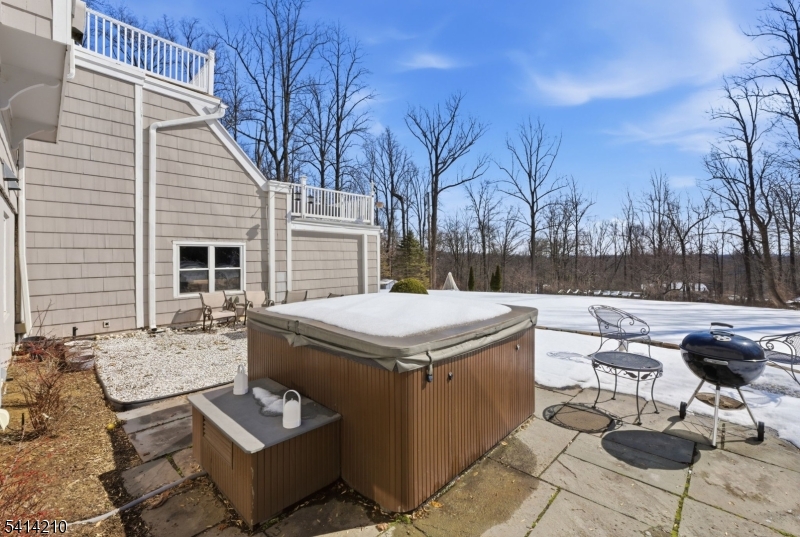 7 Post House Road Morristown, NJ 07960 - Photo 46 of 50 a view of a patio with table and chairs with wooden floor and fence