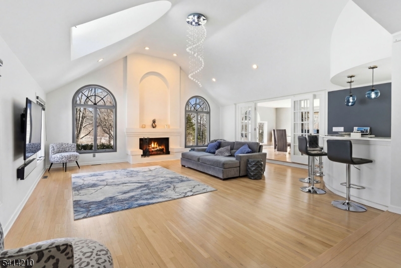 7 Post House Road Morristown, NJ 07960 - Photo 9 of 50 a living room with furniture and a flat screen tv