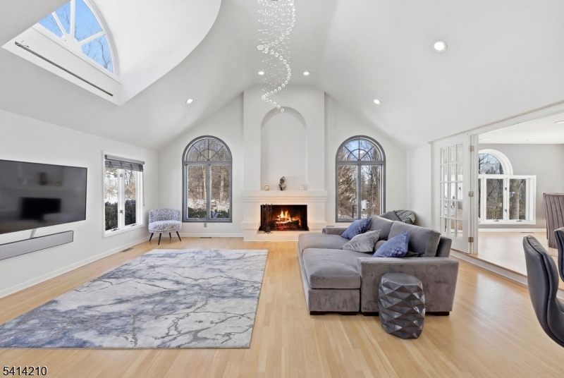 7 Post House Road Morristown, NJ 07960 - Photo 10 of 50 a living room with furniture and a flat screen tv
