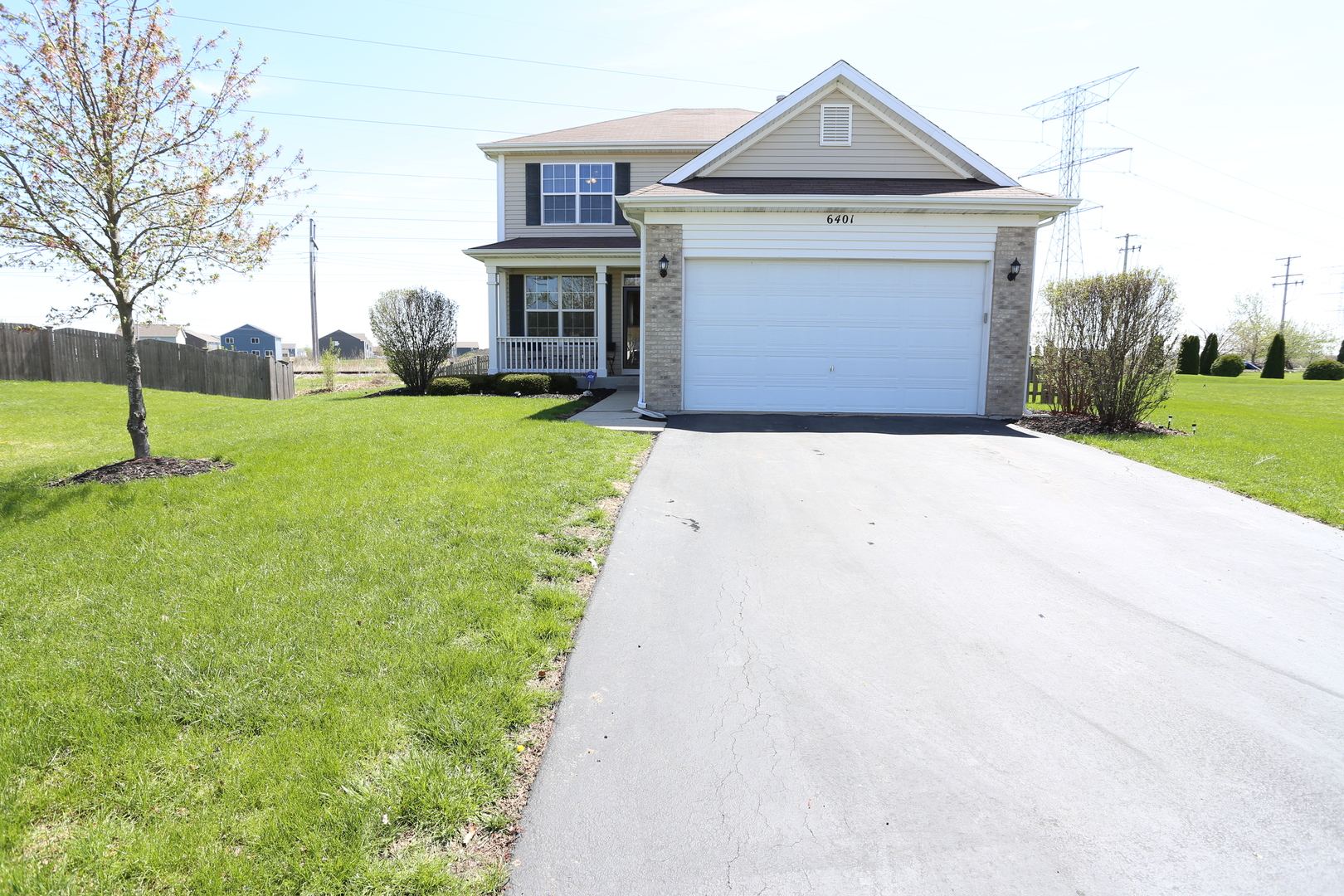 6401 Roth Court Joliet, IL 60431 - Photo 1 of 30 a front view of a house with garden