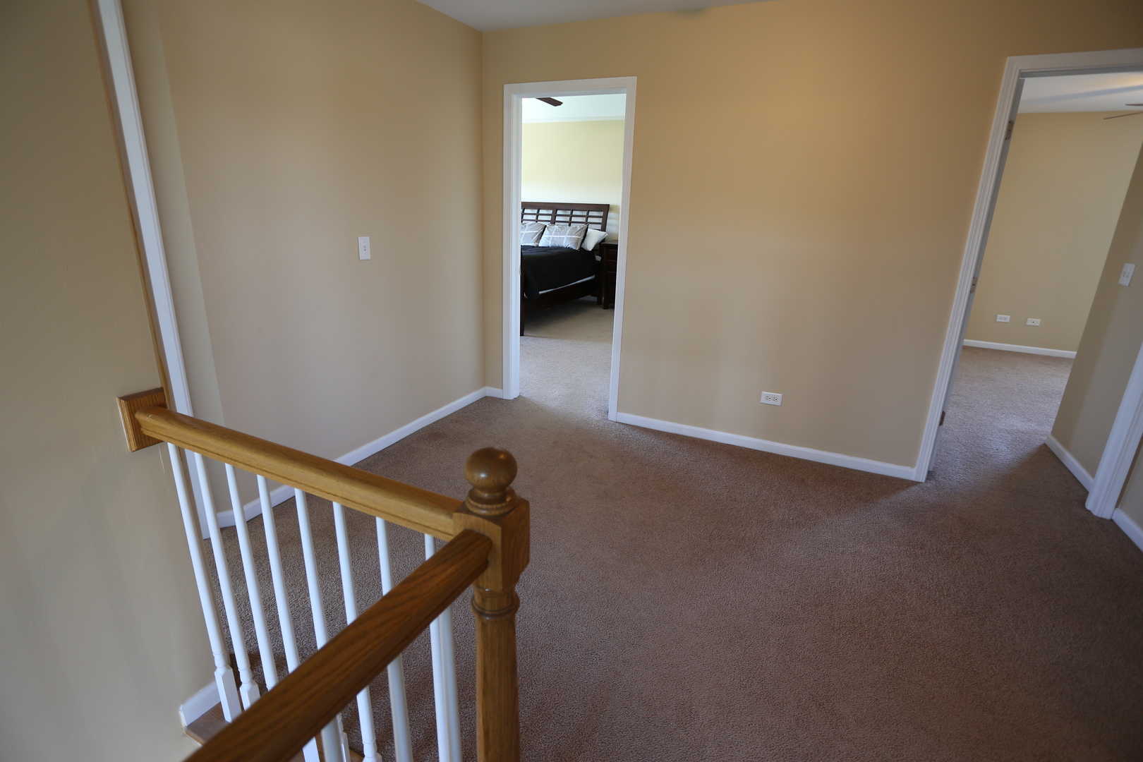 6401 Roth Court Joliet, IL 60431 - Photo 13 of 30 a view of a hallway with stairs
