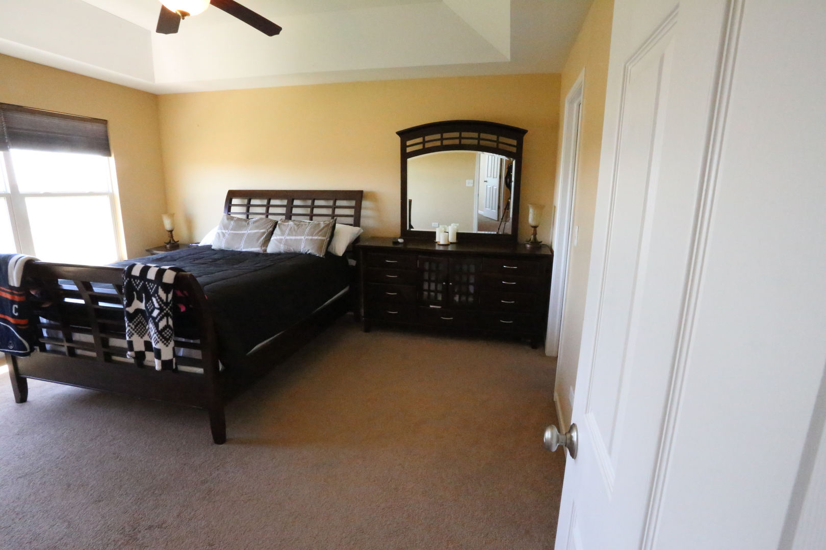 6401 Roth Court Joliet, IL 60431 - Photo 15 of 30 a bedroom with a bed and window