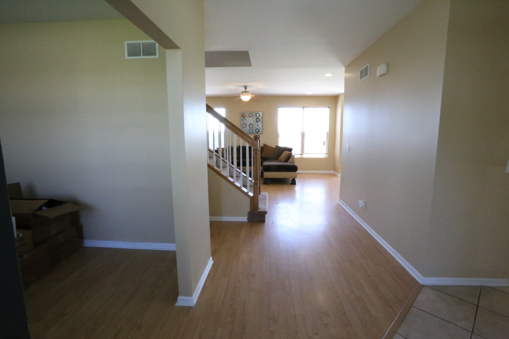 6401 Roth Court Joliet, IL 60431 - Photo 3 of 30 a view of entryway and hall with wooden floor
