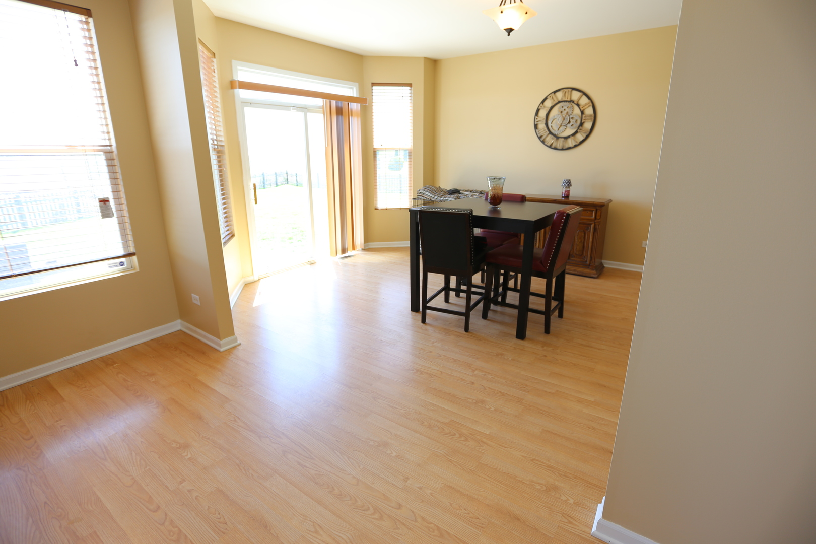 6401 Roth Court Joliet, IL 60431 - Photo 7 of 30 a view of a dining room with furniture and window