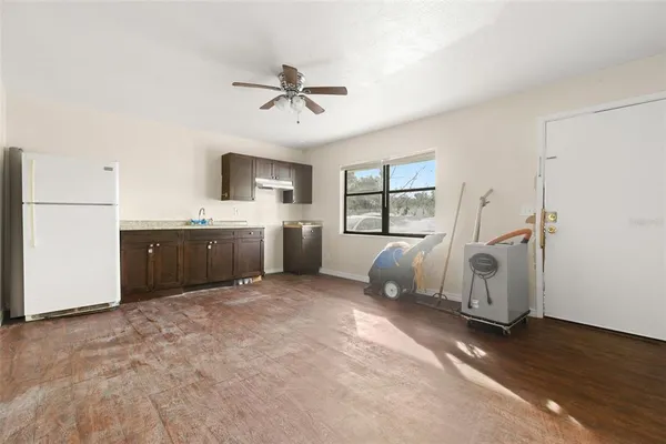 a room with a bed furniture and a window