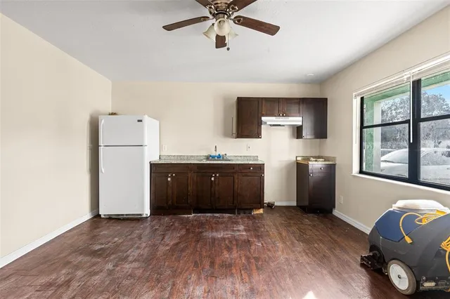 a room with a bed and a window