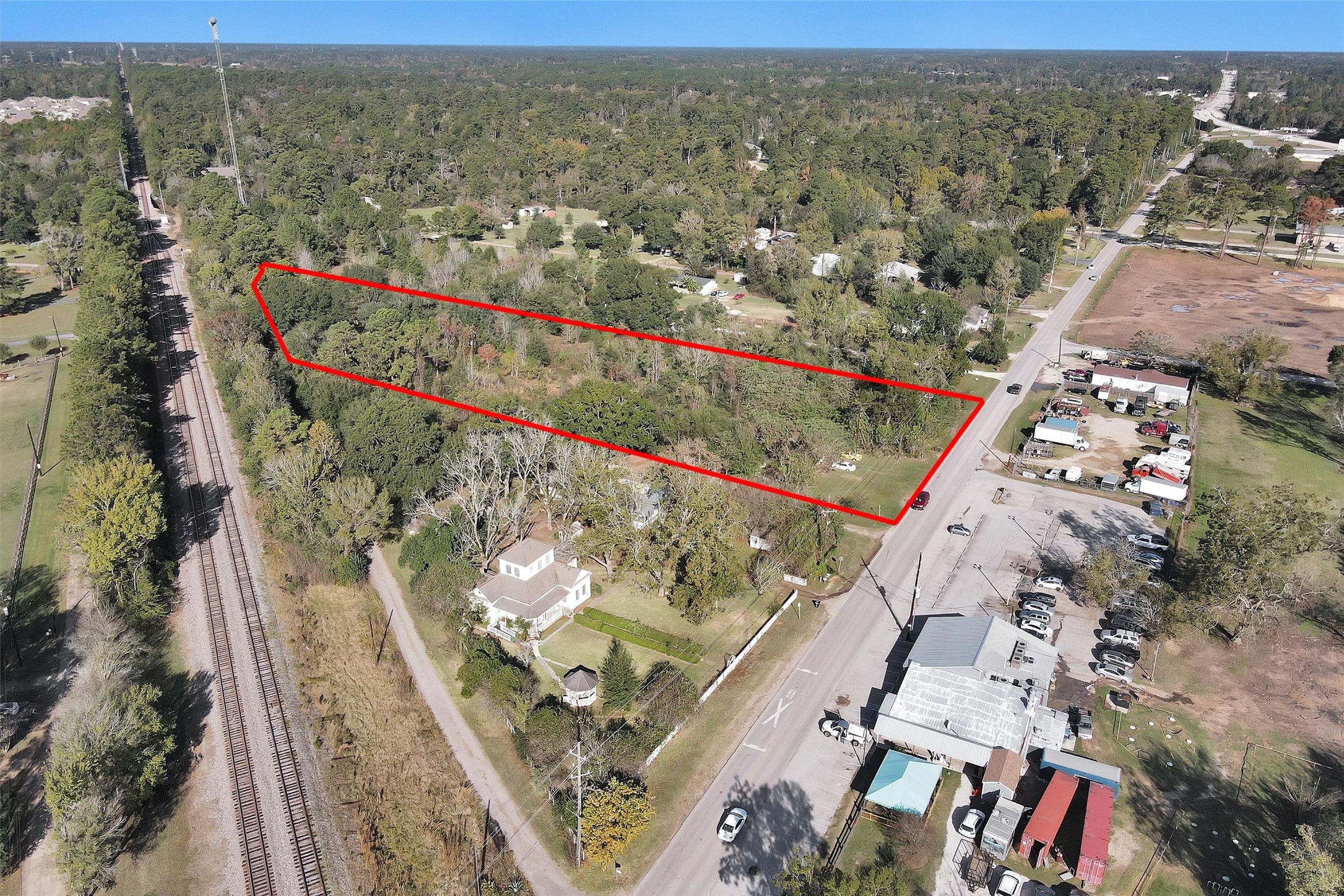 24801 Stanolind Road Tomball, TX 77375 - Photo 1 of 17 an aerial view of a city