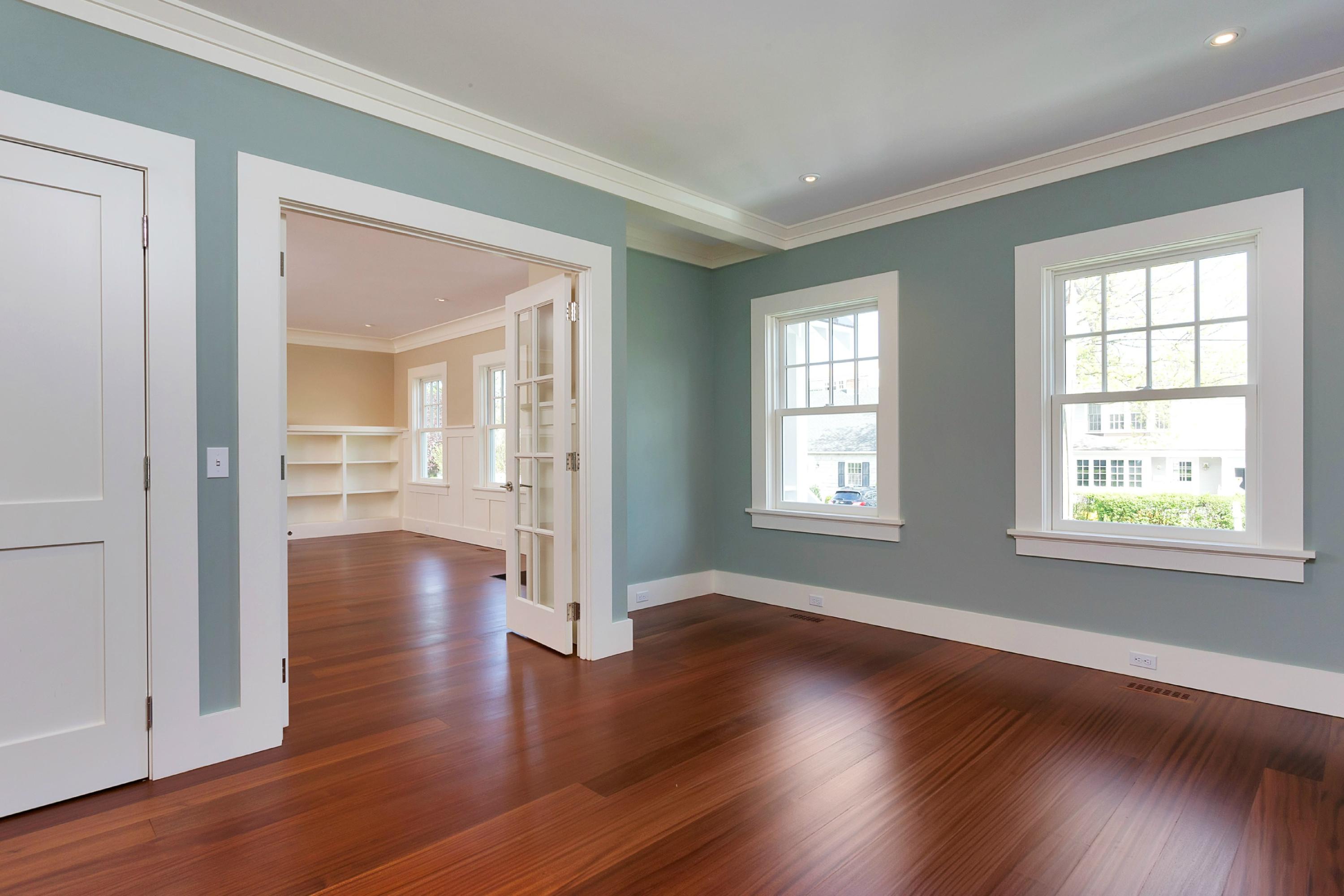 11 Juniper Road Rowayton, CT 06853 - Photo 8 of 23 an empty room with wooden floor and windows