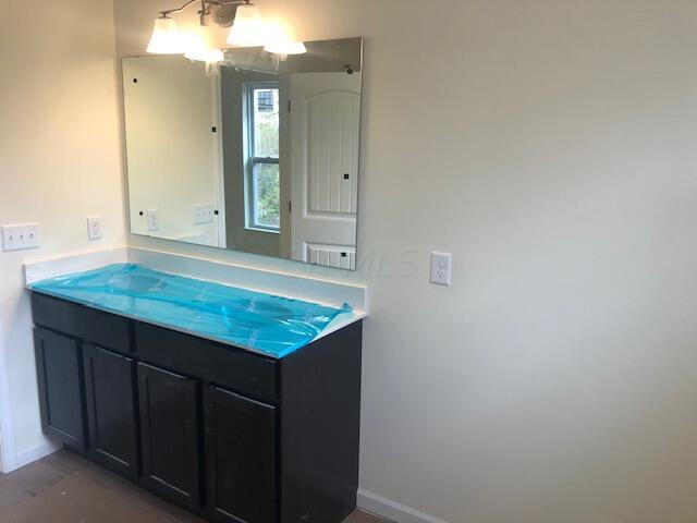 11 Thurber Road Ashville, OH 43103 - Photo 13 of 28 UP HALL BATH w/QUARTZ C-TOP & LVP FLOORING