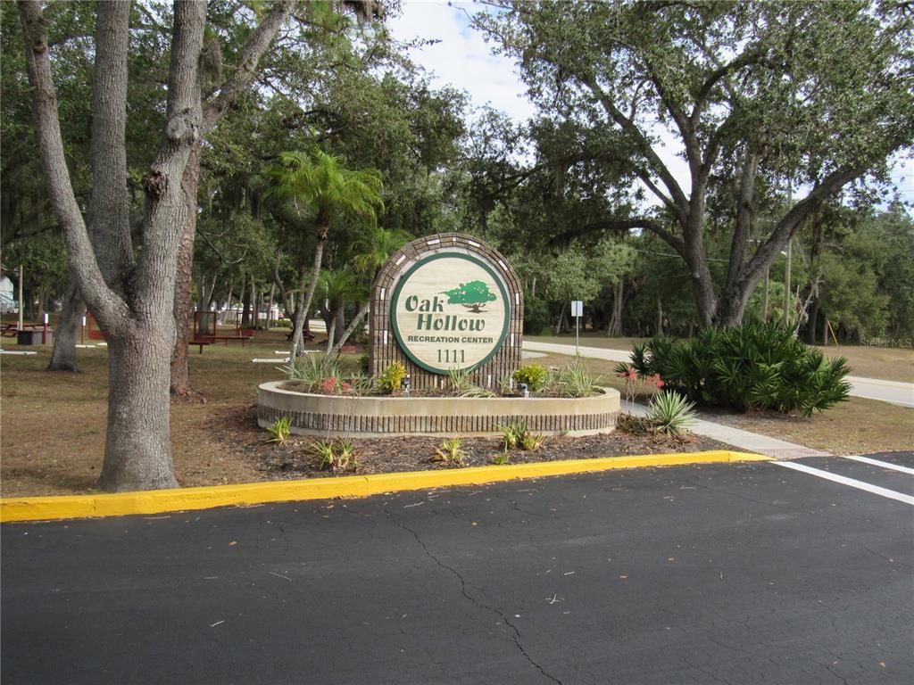 20005 Goldcup Court Port Charlotte, FL 33952 - Photo 4 of 33 a view of a swimming pool with a yard and large trees