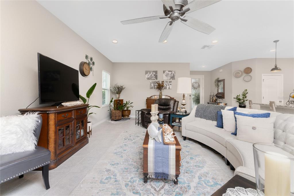 25381 Rupert Road Punta Gorda, FL 33983 - Photo 3 of 58 a living room with furniture and a flat screen tv