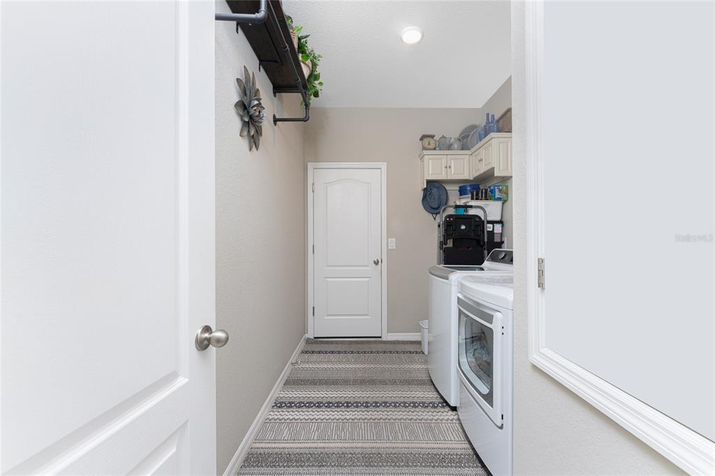 25381 Rupert Road Punta Gorda, FL 33983 - Photo 34 of 58 a view of entryway and hall with wooden floor