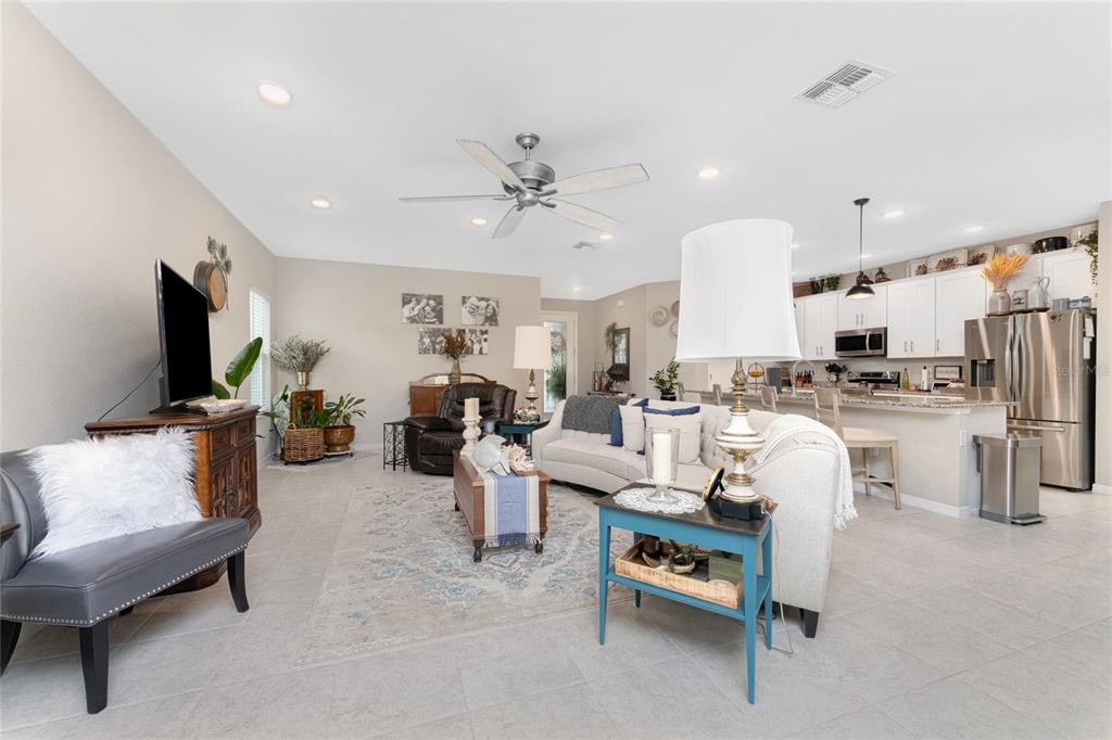 25381 Rupert Road Punta Gorda, FL 33983 - Photo 4 of 58 a living room with furniture and a flat screen tv