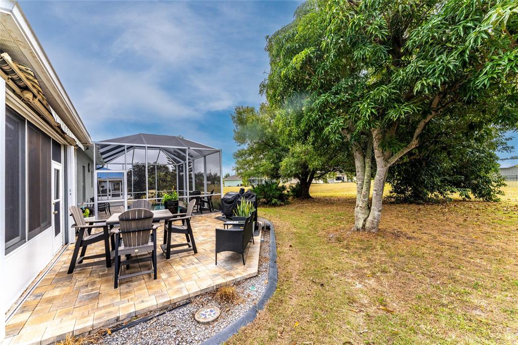 25381 Rupert Road Punta Gorda, FL 33983 - Photo 47 of 58 a building outdoor space with patio furniture and potted plants