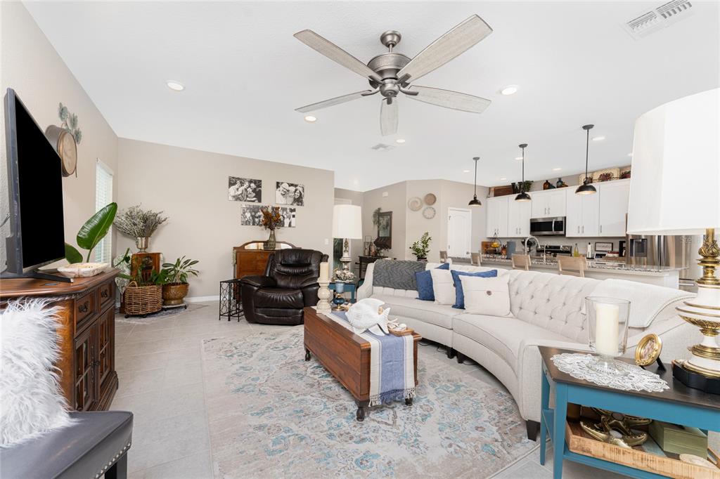 25381 Rupert Road Punta Gorda, FL 33983 - Photo 5 of 58 a living room with furniture and a flat screen tv
