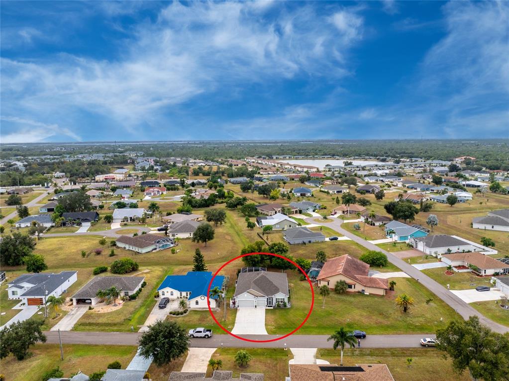 25381 Rupert Road Punta Gorda, FL 33983 - Photo 54 of 58 an aerial view of residential houses with outdoor space