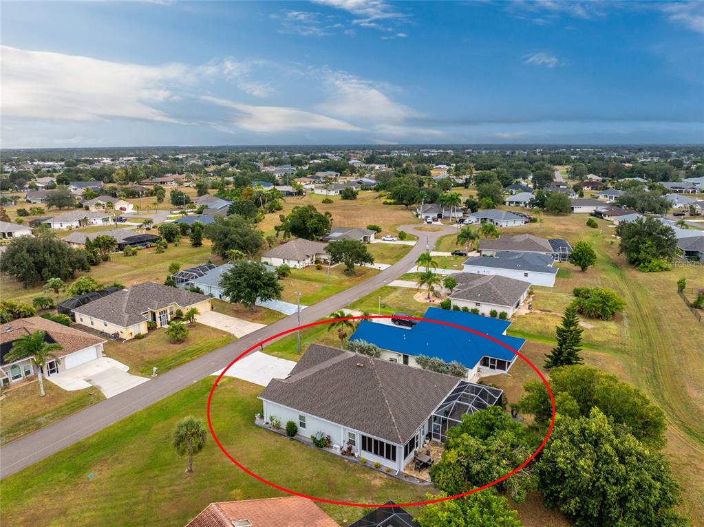 25381 Rupert Road Punta Gorda, FL 33983 - Photo 57 of 58 an aerial view of residential houses with outdoor space