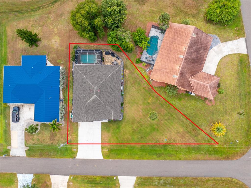 25381 Rupert Road Punta Gorda, FL 33983 - Photo 58 of 58 a aerial view of a house with backyard
