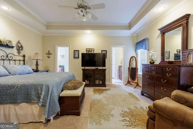 a bedroom with a bed and furniture