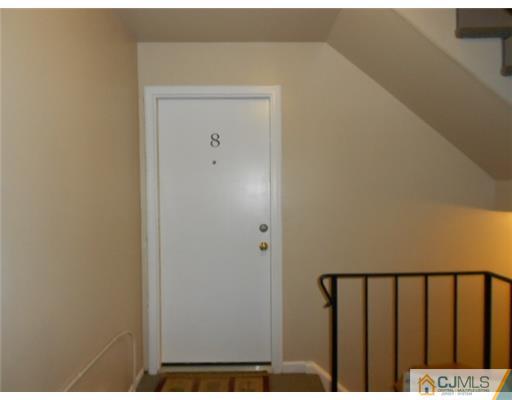200 Portland Road, Unit D8 Highlands, NJ 07732 - Photo 3 of 10 a view of a wooden door