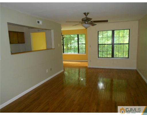 200 Portland Road, Unit D8 Highlands, NJ 07732 - Photo 4 of 10 a view of an empty room with a window