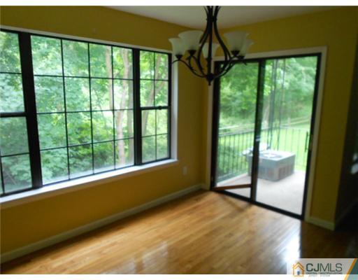 200 Portland Road, Unit D8 Highlands, NJ 07732 - Photo 5 of 10 a view of an empty room and window