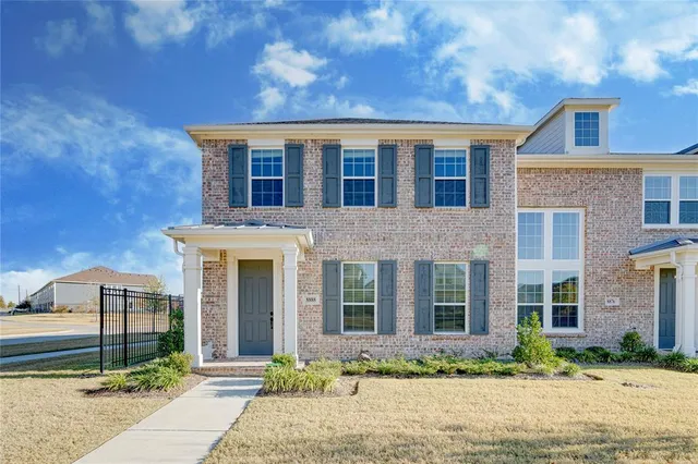 a front view of house with yard