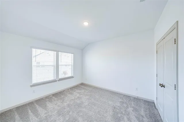 a bathroom with a double vanity sink a mirror and a shower