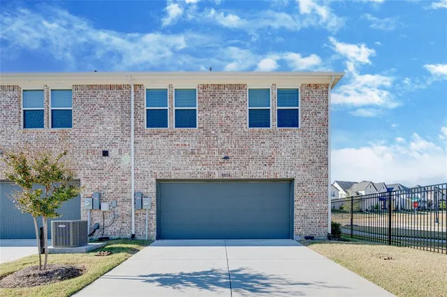a bathroom with a tub a sink and a shower