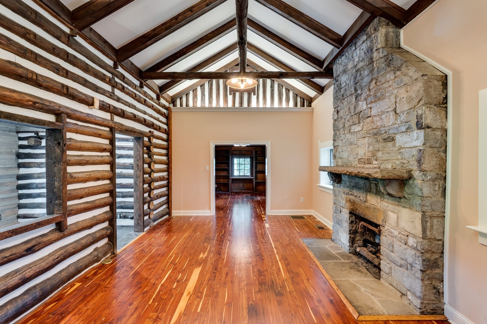 711 Hill Road Brentwood, TN 37027 - Photo 14 of 66 a view of a livingroom with wooden floor and staircase