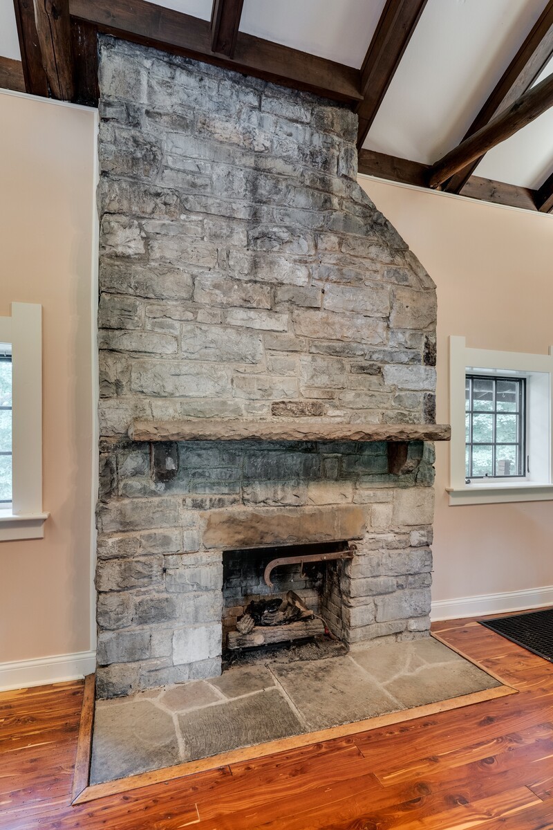 711 Hill Road Brentwood, TN 37027 - Photo 16 of 66 a view of fireplace and wooden floor