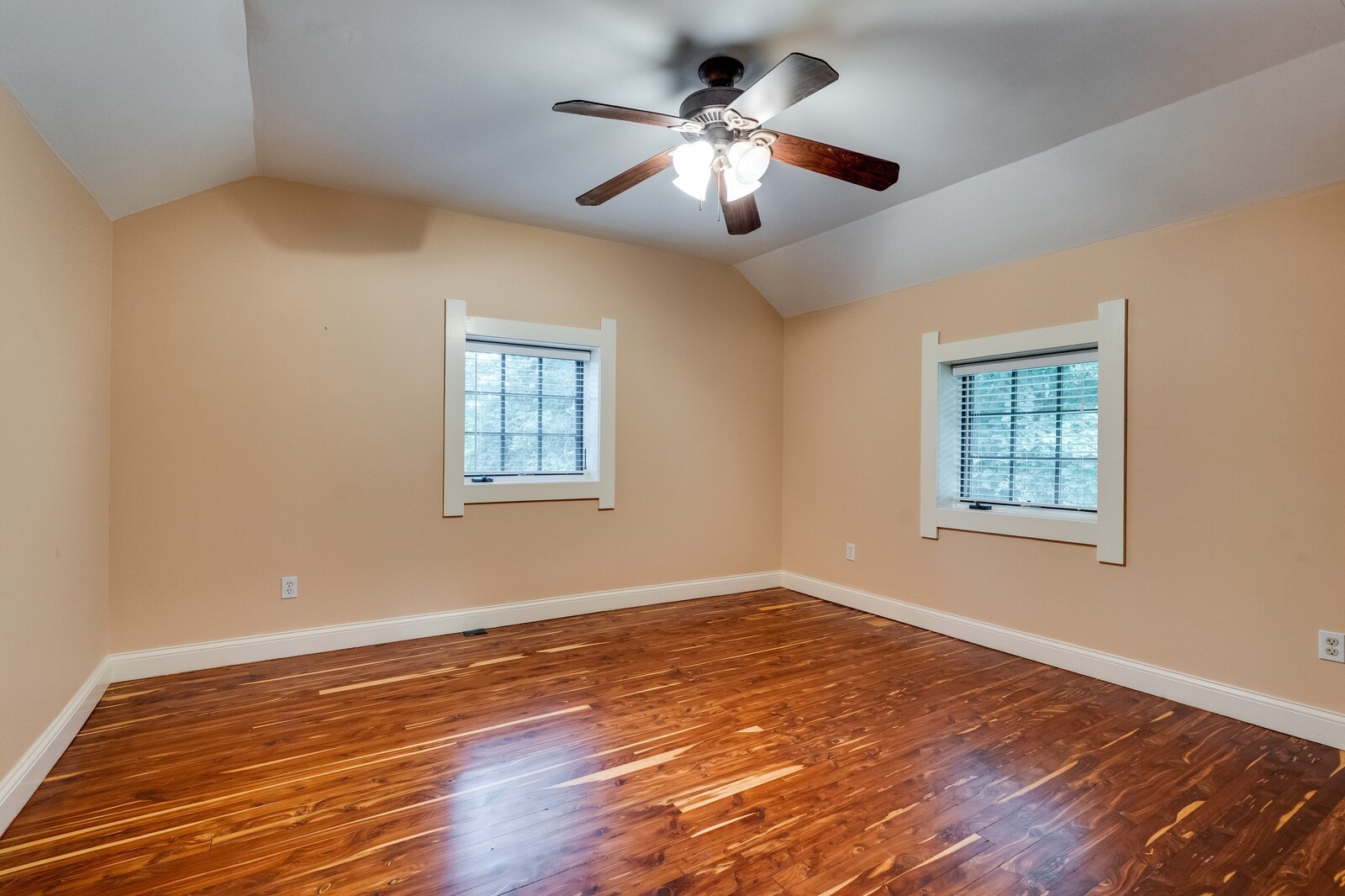 711 Hill Road Brentwood, TN 37027 - Photo 21 of 66 a view of a big room with wooden floor and windows