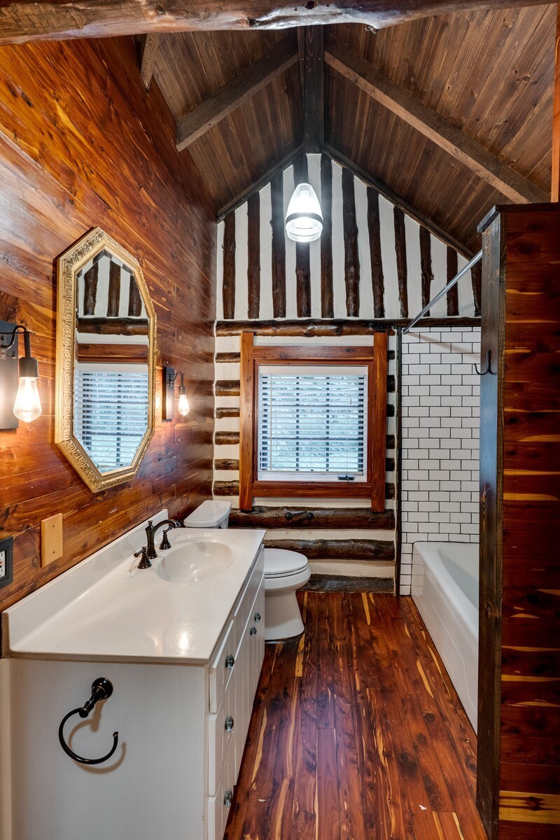 711 Hill Road Brentwood, TN 37027 - Photo 23 of 66 a bathroom with a sink a mirror and a shower