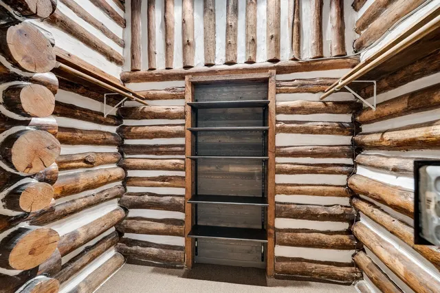 a kitchen with a stove a sink and a refrigerator