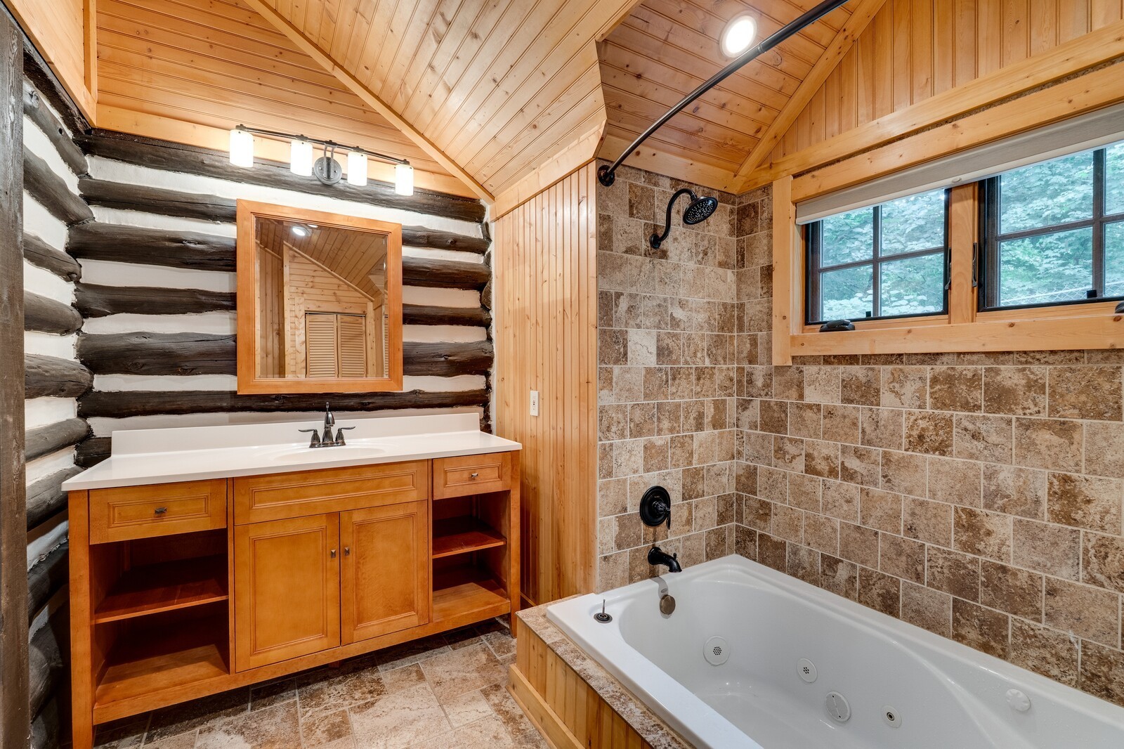 711 Hill Road Brentwood, TN 37027 - Photo 29 of 66 a bathroom with a tub sink and mirror