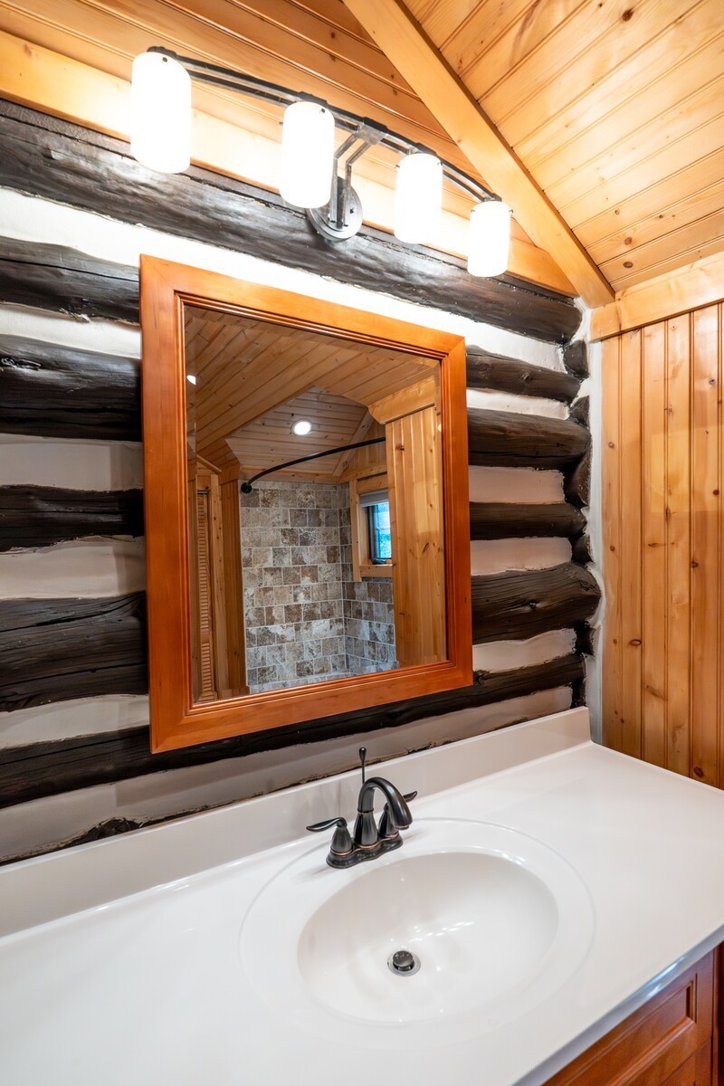 711 Hill Road Brentwood, TN 37027 - Photo 30 of 66 a bathroom with a sink and a mirror
