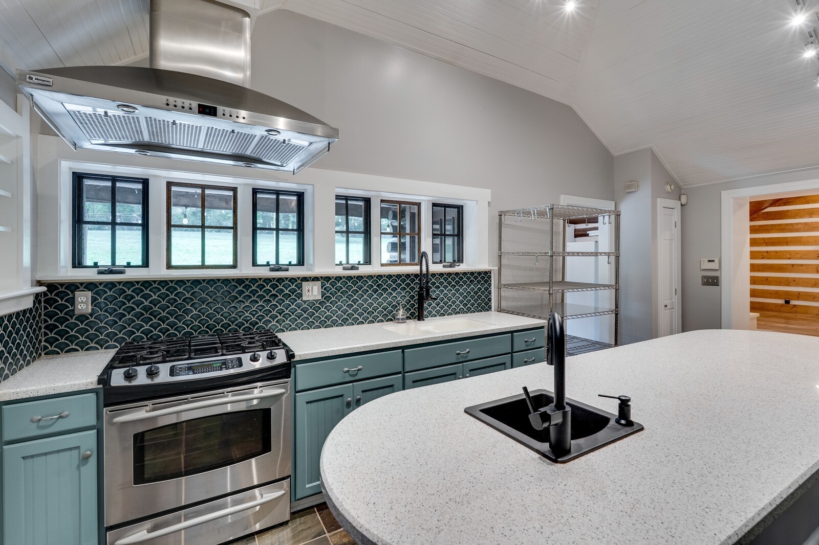 711 Hill Road Brentwood, TN 37027 - Photo 35 of 66 a kitchen with a stove a sink and a refrigerator