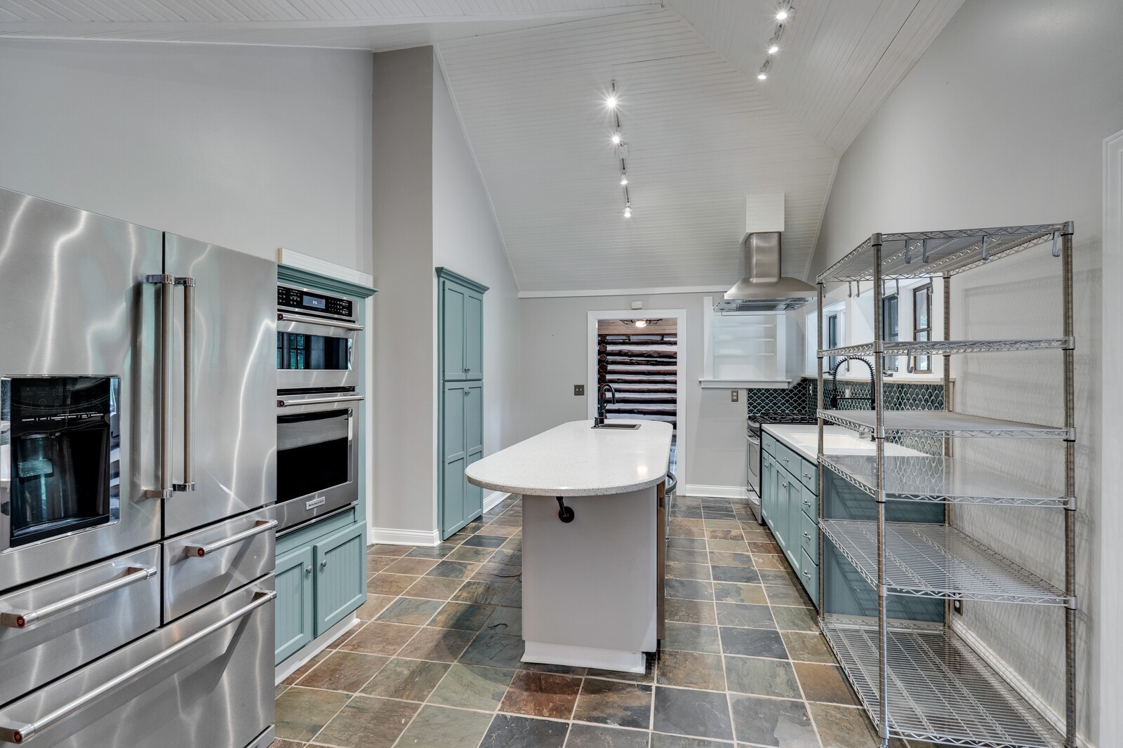 711 Hill Road Brentwood, TN 37027 - Photo 38 of 66 a kitchen with stainless steel appliances a refrigerator and a stove top oven