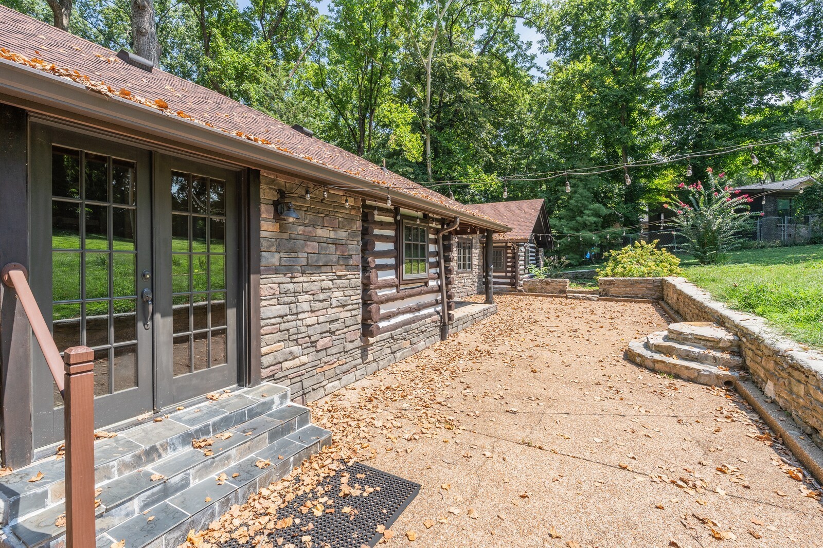 711 Hill Road Brentwood, TN 37027 - Photo 57 of 66 a backyard of a house with wooden floor and outdoor seating