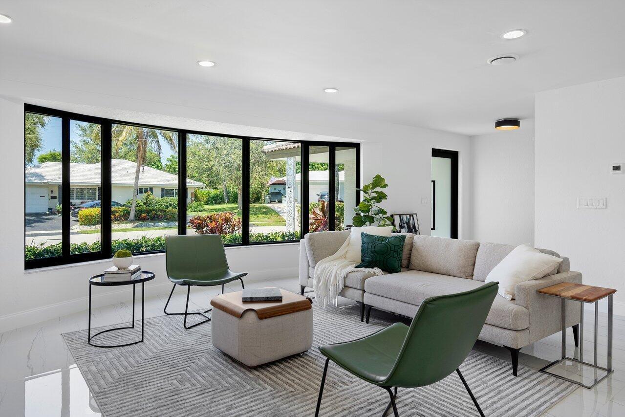1200 Southwest 8th Street Boca Raton, FL 33486 - Photo 13 of 42 a living room with furniture and a large window
