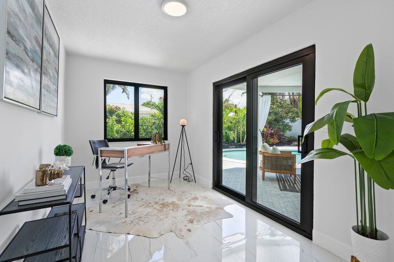 1200 Southwest 8th Street Boca Raton, FL 33486 - Photo 18 of 42 a living room with furniture and a window